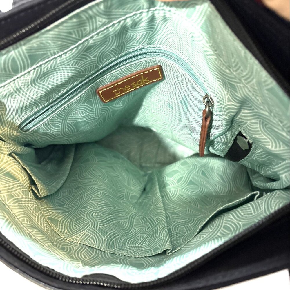 The Sak Black Leather Backpack Crossbody with Mint Patterned Interior - Picture 3 of 10